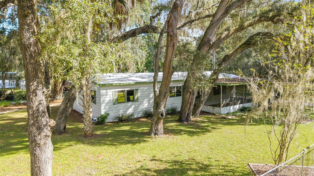 18395 Northwest 4th Terrace Citra, FL 32113 - Photo 10 of 66 a view of a house with swimming pool