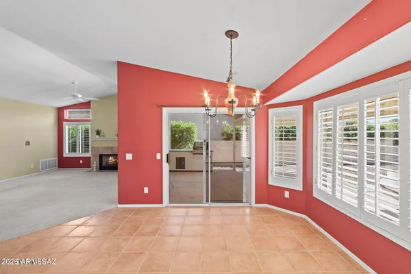 a view of an empty room with a balcony
