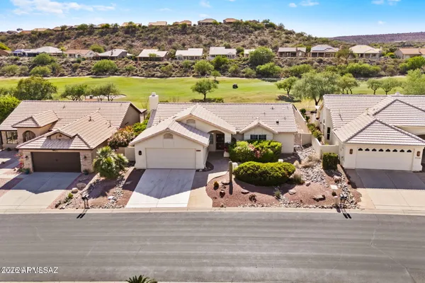 an aerial view of a house with a garden