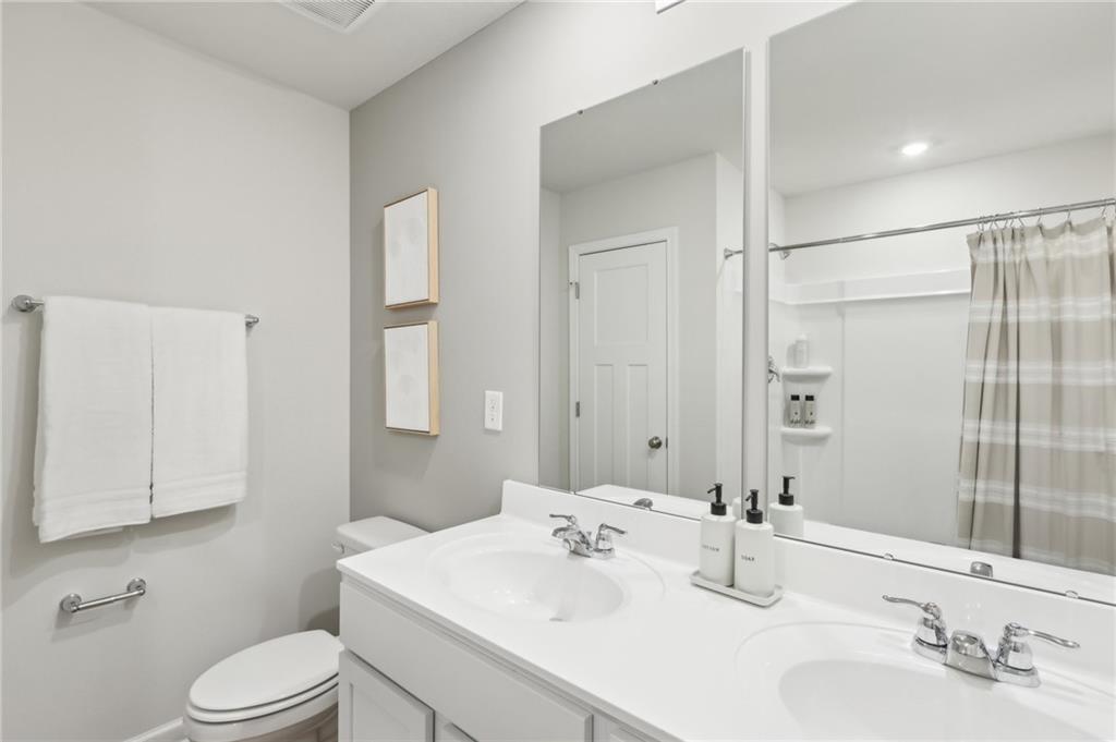 504 Cherry Tree Drive Butler, PA 16001 - Photo 16 of 20 a bathroom with a sink toilet and shower