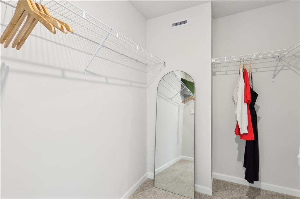 504 Cherry Tree Drive Butler, PA 16001 - Photo 18 of 20 a view of walk in closet with clothes