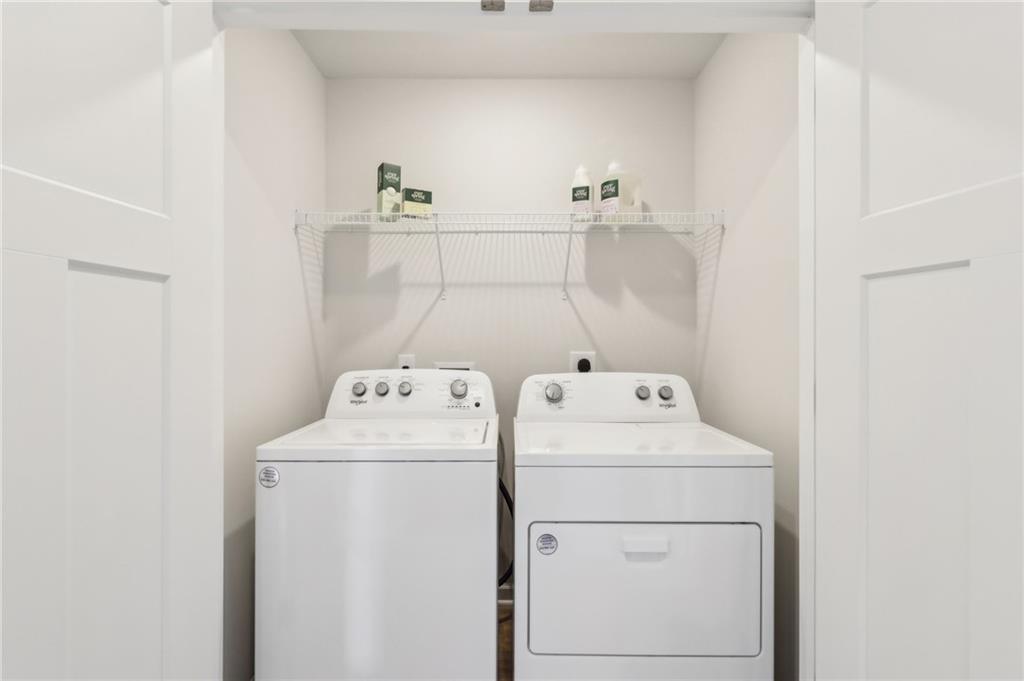 504 Cherry Tree Drive Butler, PA 16001 - Photo 19 of 20 a utility room with dryer and washer
