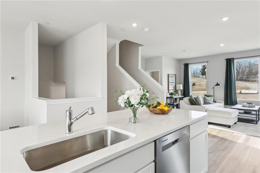 504 Cherry Tree Drive Butler, PA 16001 - Photo 6 of 20 a kitchen with a sink and breakfast area