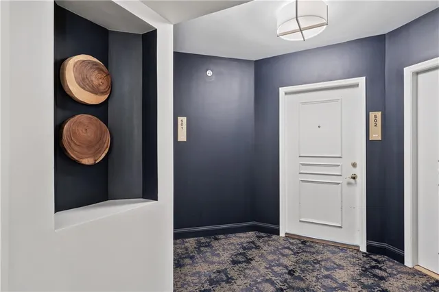 a view of a livingroom with wooden floor