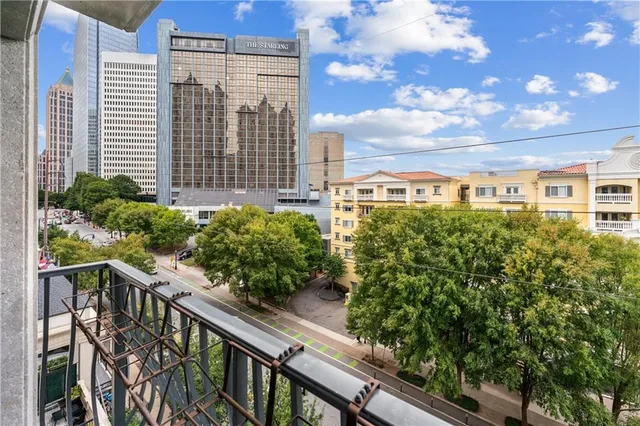 a view of balcony with furniture