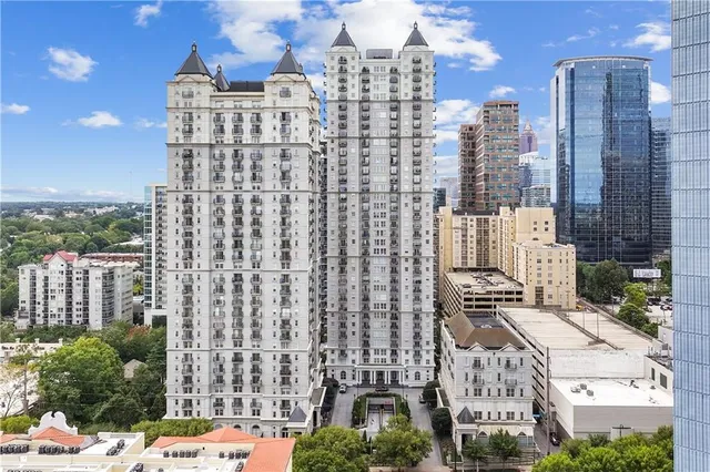a view of a city with tall buildings