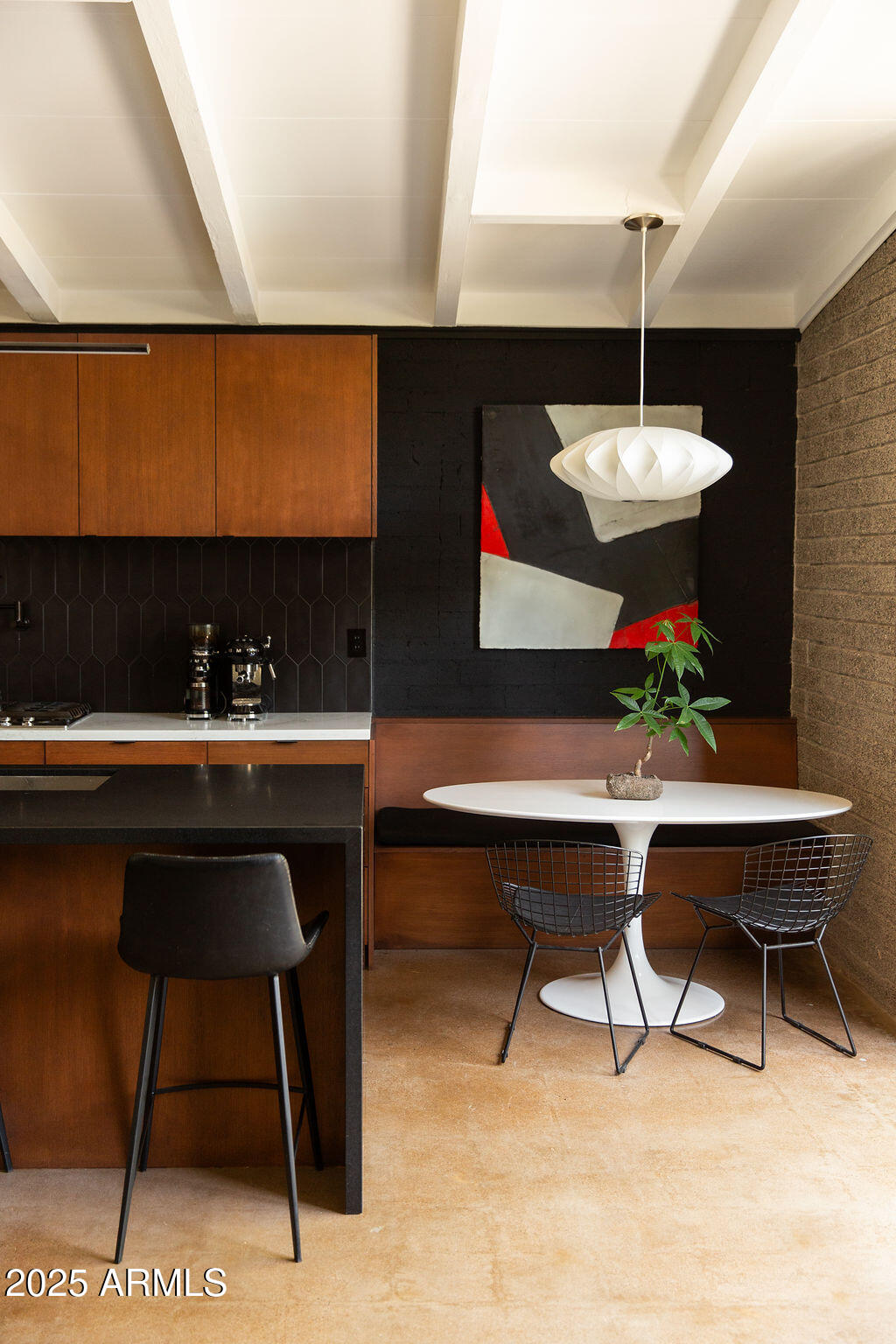 4032 North 45th Place Phoenix, AZ 85018 - Photo 11 of 38 a room with a table chair and a potted plant