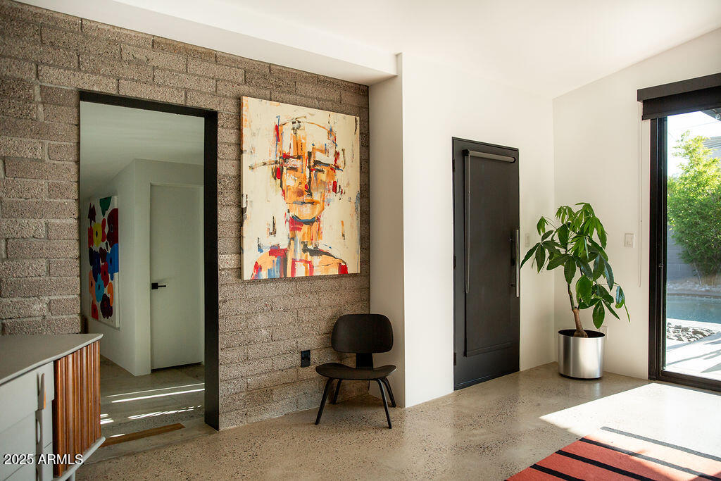 4032 North 45th Place Phoenix, AZ 85018 - Photo 15 of 38 a living room with furniture and potted plant