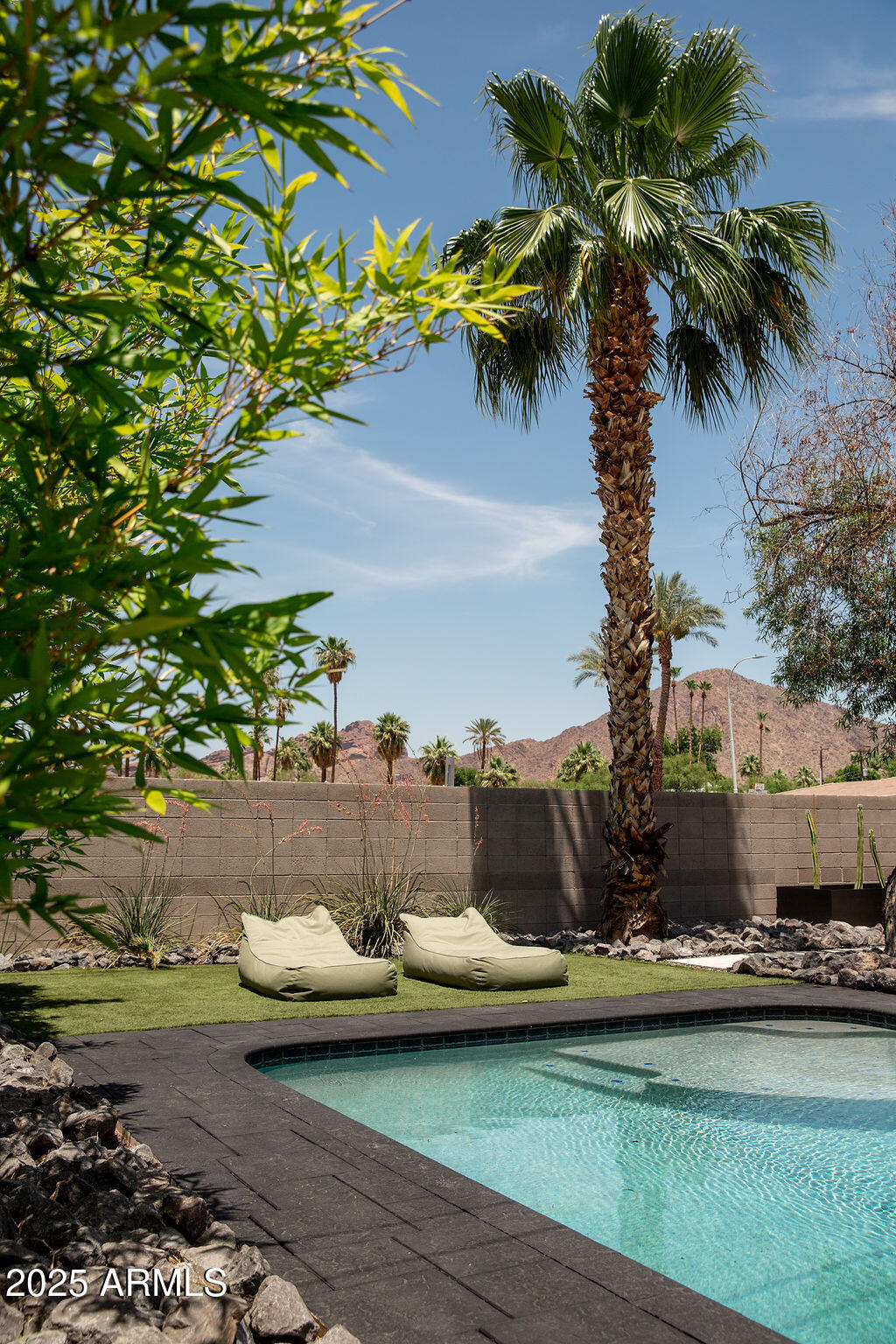 4032 North 45th Place Phoenix, AZ 85018 - Photo 19 of 38 a view of a yard with an outdoor seating
