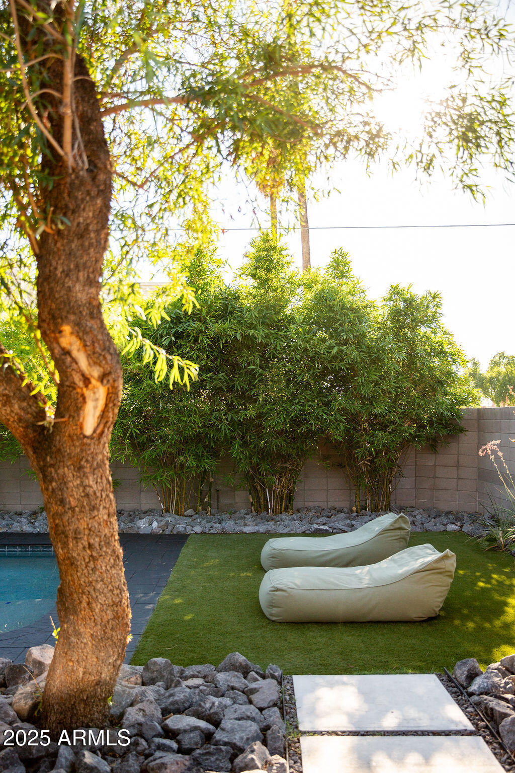 4032 North 45th Place Phoenix, AZ 85018 - Photo 22 of 38 a view of a fountain in the backyard of a house