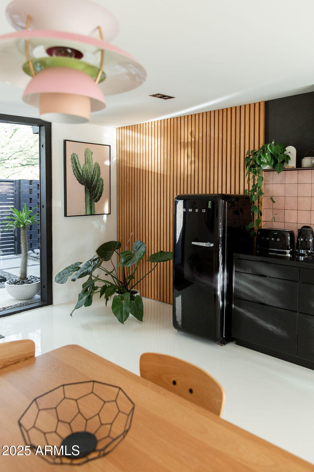 4032 North 45th Place Phoenix, AZ 85018 - Photo 23 of 38 a dining room with furniture and a window