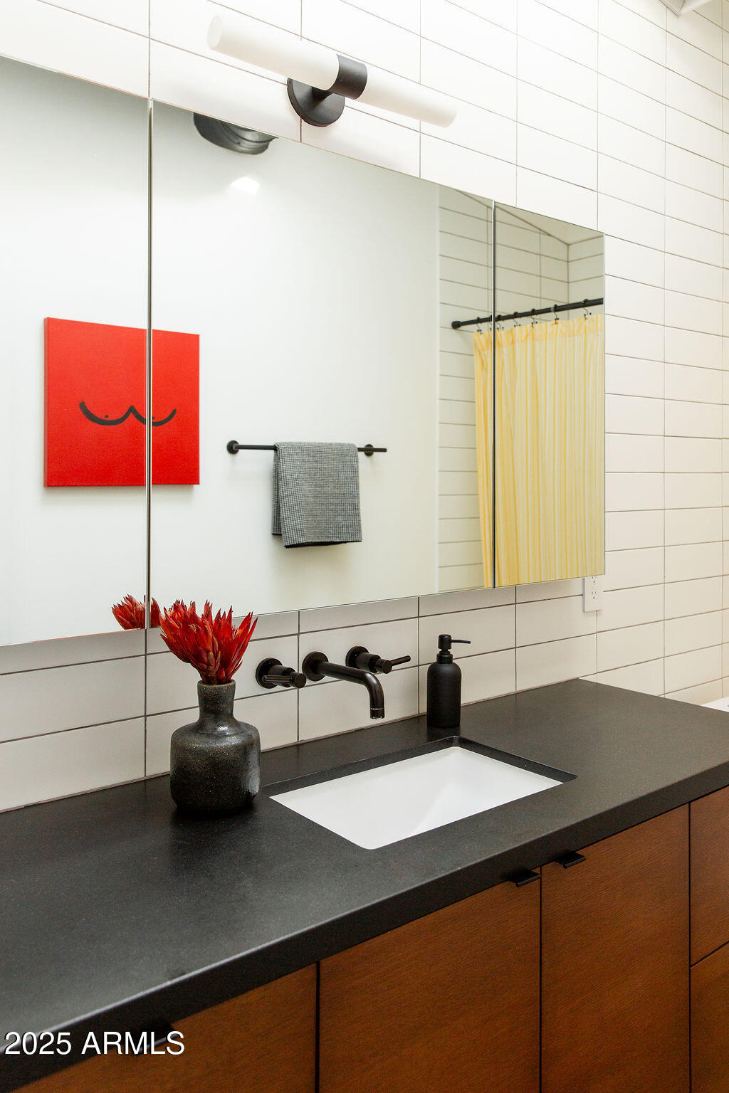 4032 North 45th Place Phoenix, AZ 85018 - Photo 29 of 38 a kitchen with a sink a stove and cabinets