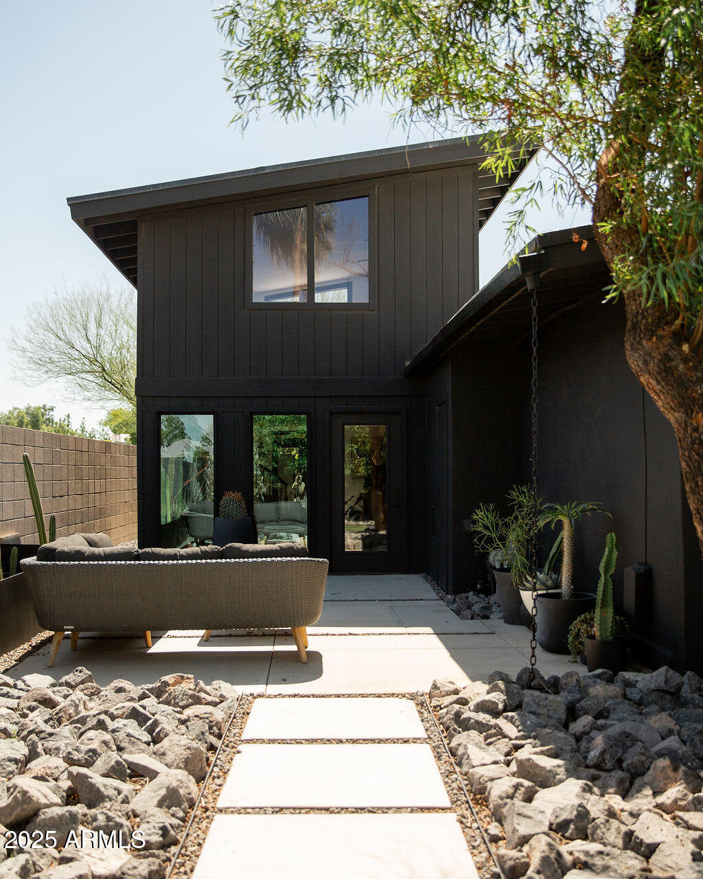 4032 North 45th Place Phoenix, AZ 85018 - Photo 33 of 38 a front view of a house with garden