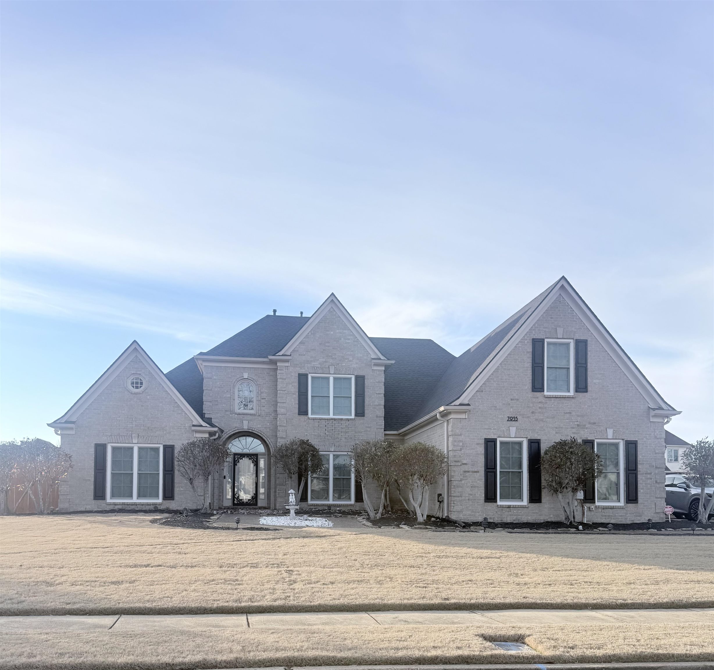 a front view of a house with a porch
