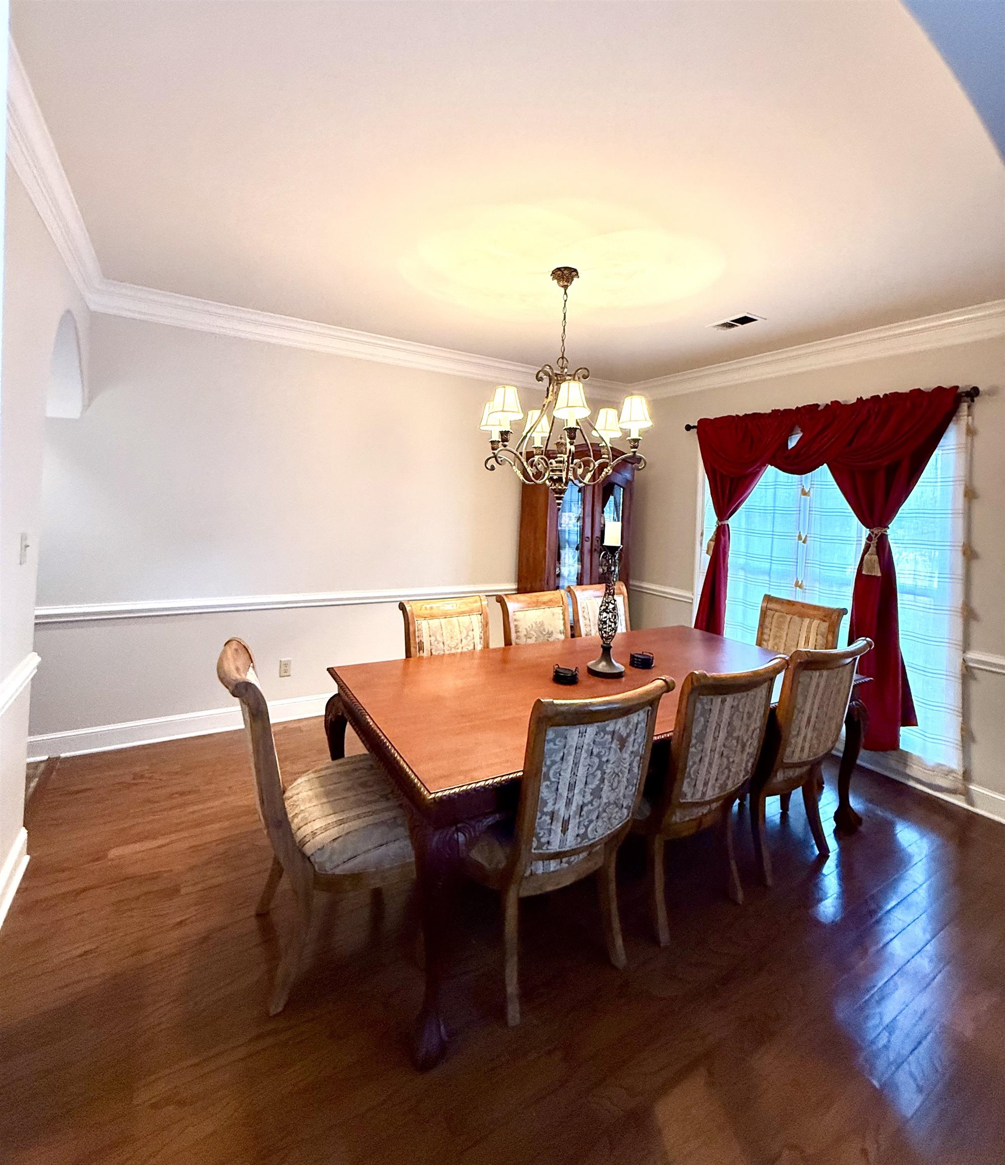 7935 Oak Spring Cove Millington, TN 38053 - Photo 13 of 39 a view of a dining room with furniture and wooden floor