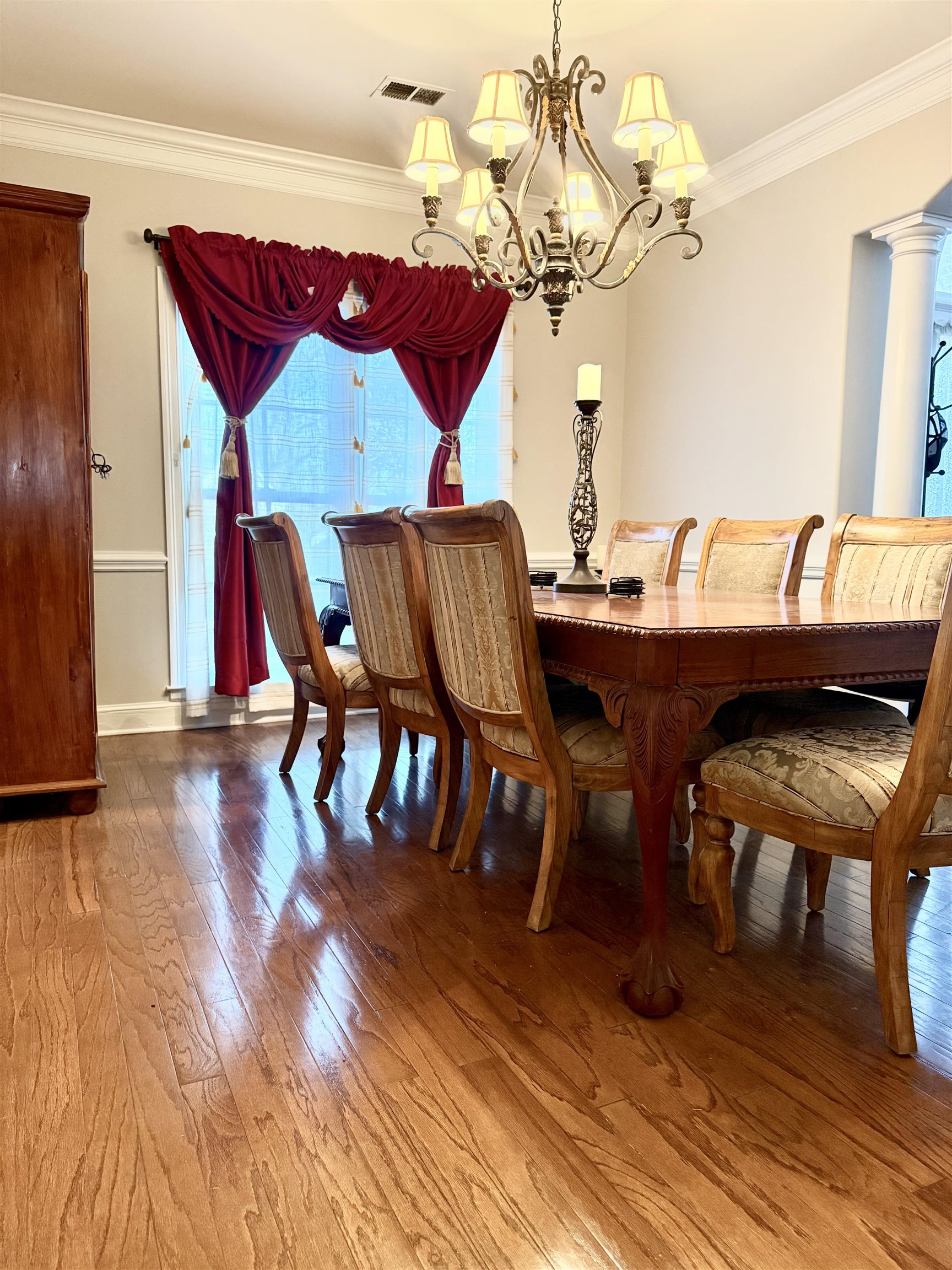 7935 Oak Spring Cove Millington, TN 38053 - Photo 14 of 39 a view of a dining room with furniture and wooden floor