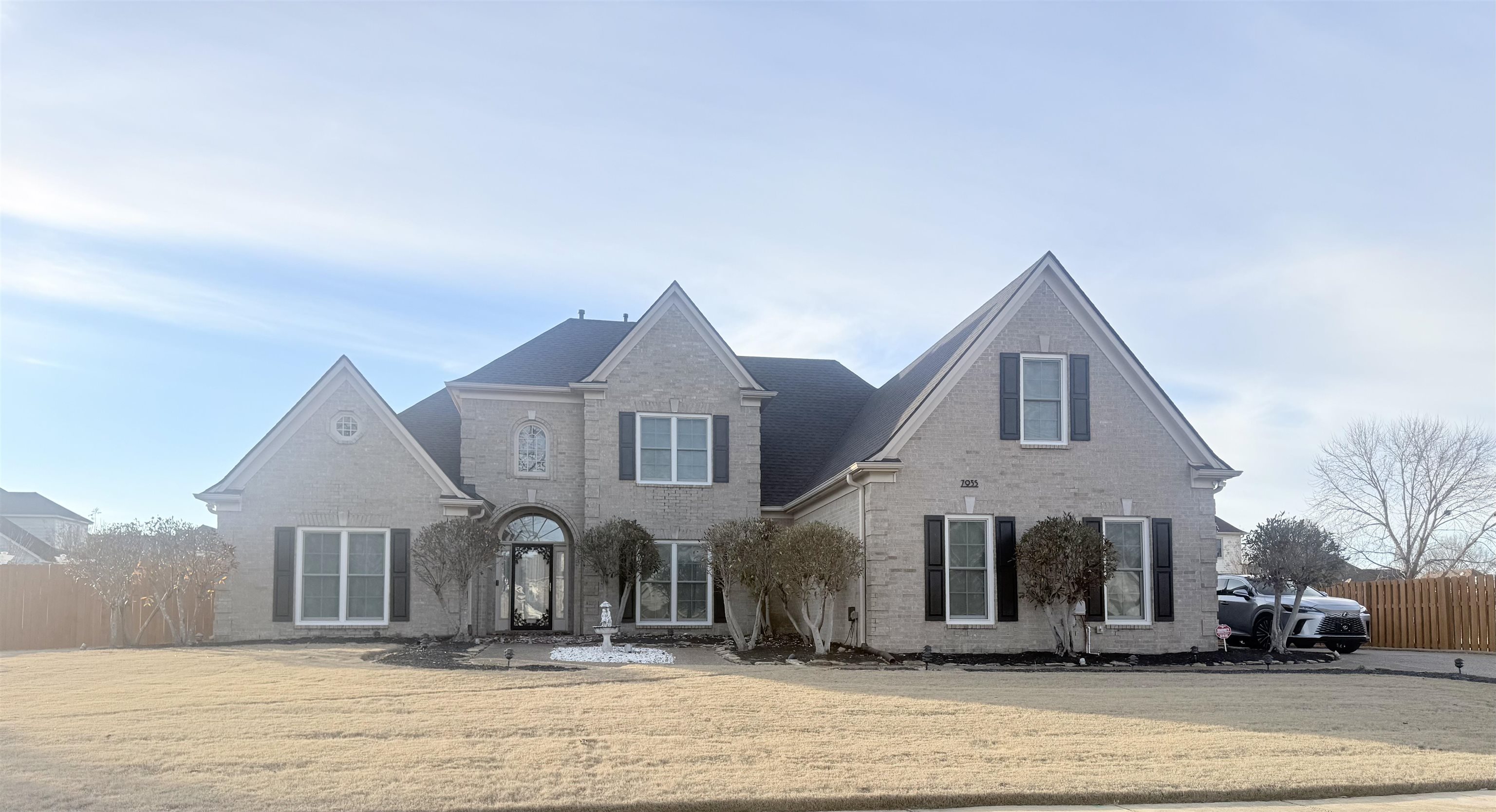 7935 Oak Spring Cove Millington, TN 38053 - Photo 2 of 39 a front view of a house with a view of a house