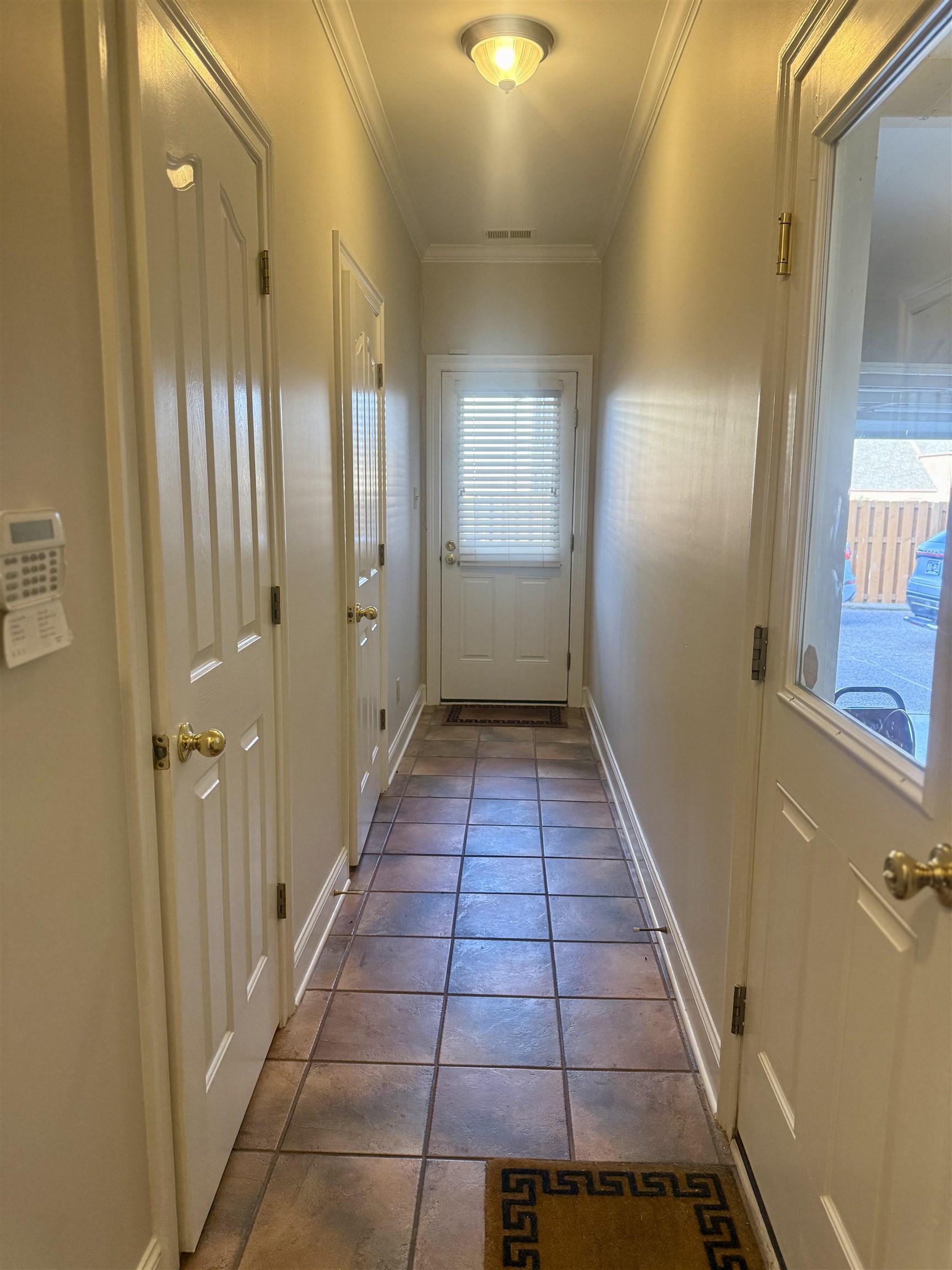 7935 Oak Spring Cove Millington, TN 38053 - Photo 30 of 39 a view of a hallway with wooden floor and staircase