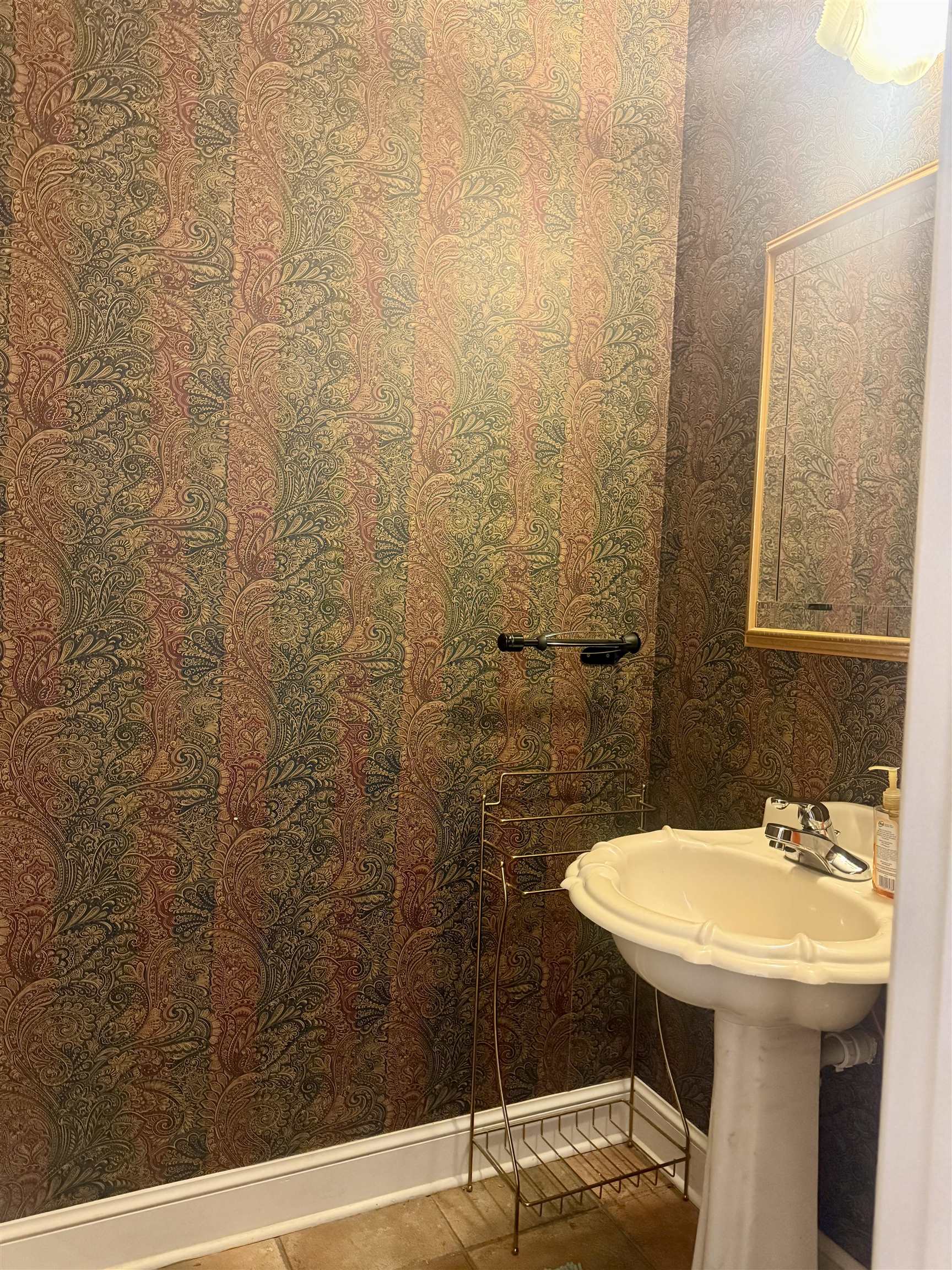 7935 Oak Spring Cove Millington, TN 38053 - Photo 31 of 39 a bathroom with a sink a mirror and a shower