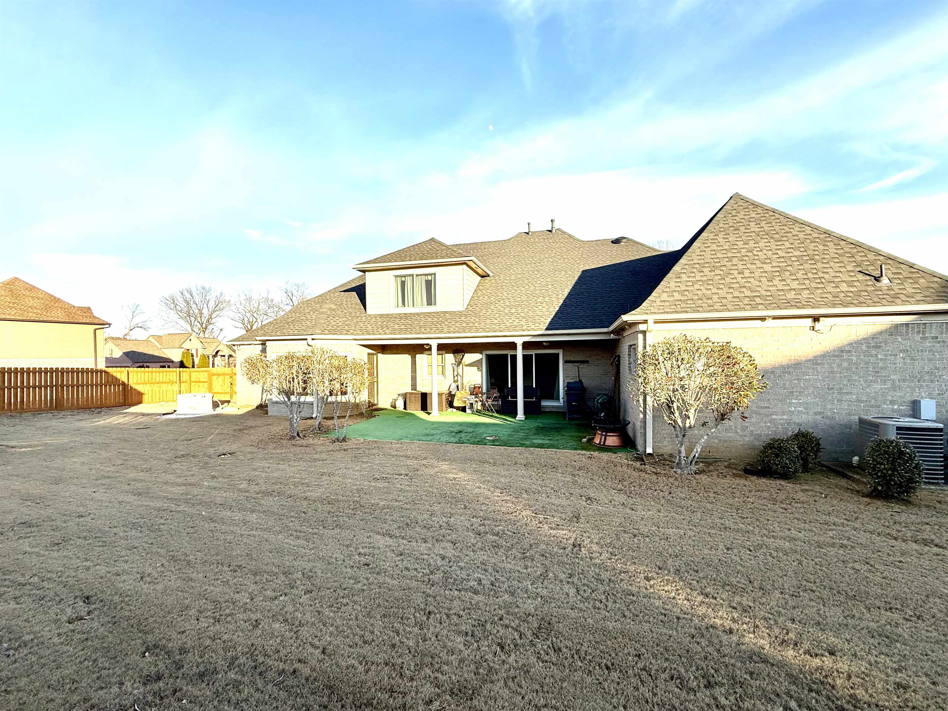 7935 Oak Spring Cove Millington, TN 38053 - Photo 33 of 39 a view of a house with a yard and garage