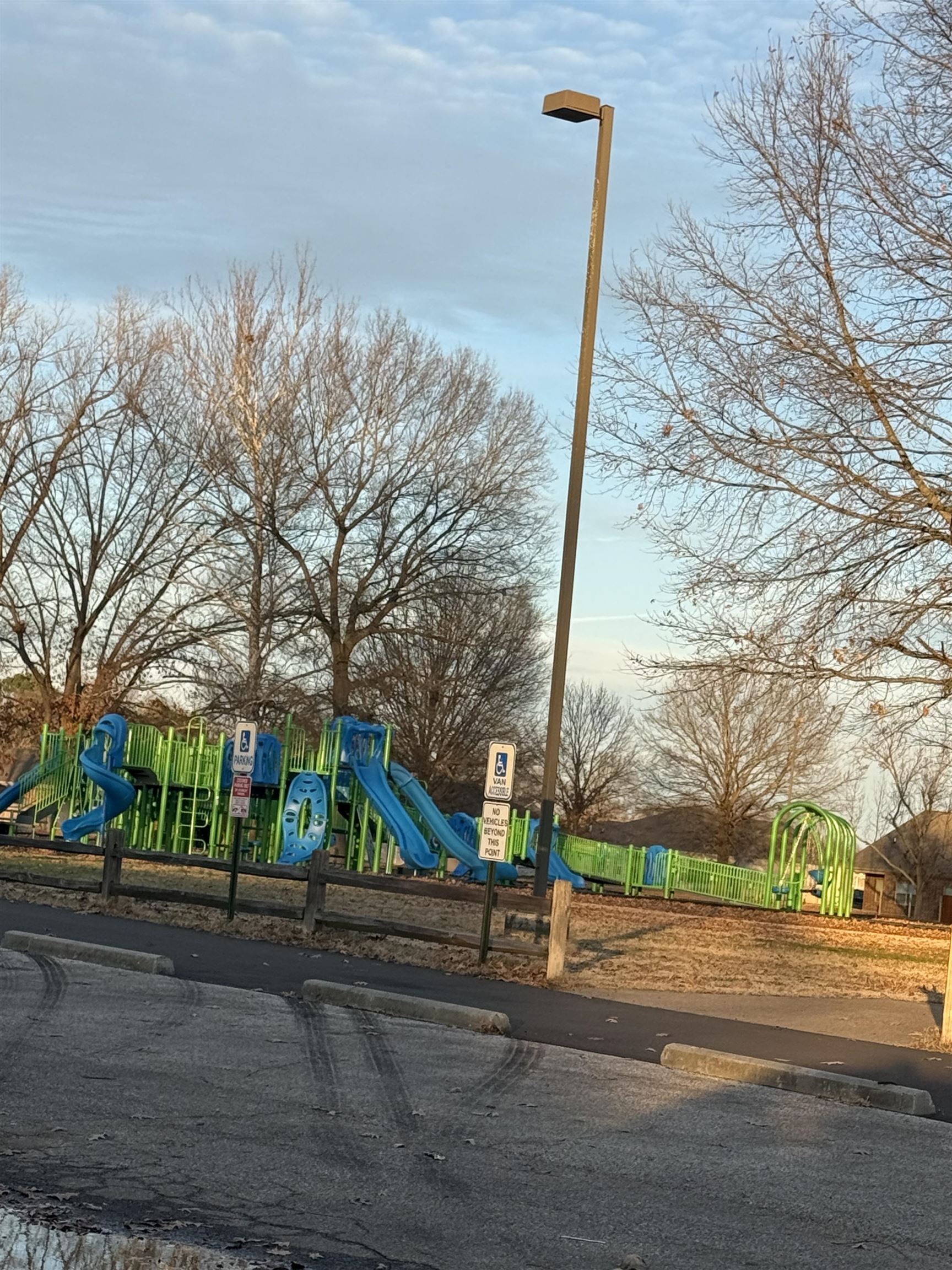 7935 Oak Spring Cove Millington, TN 38053 - Photo 39 of 39 a street sign on a sidewalk next to a road