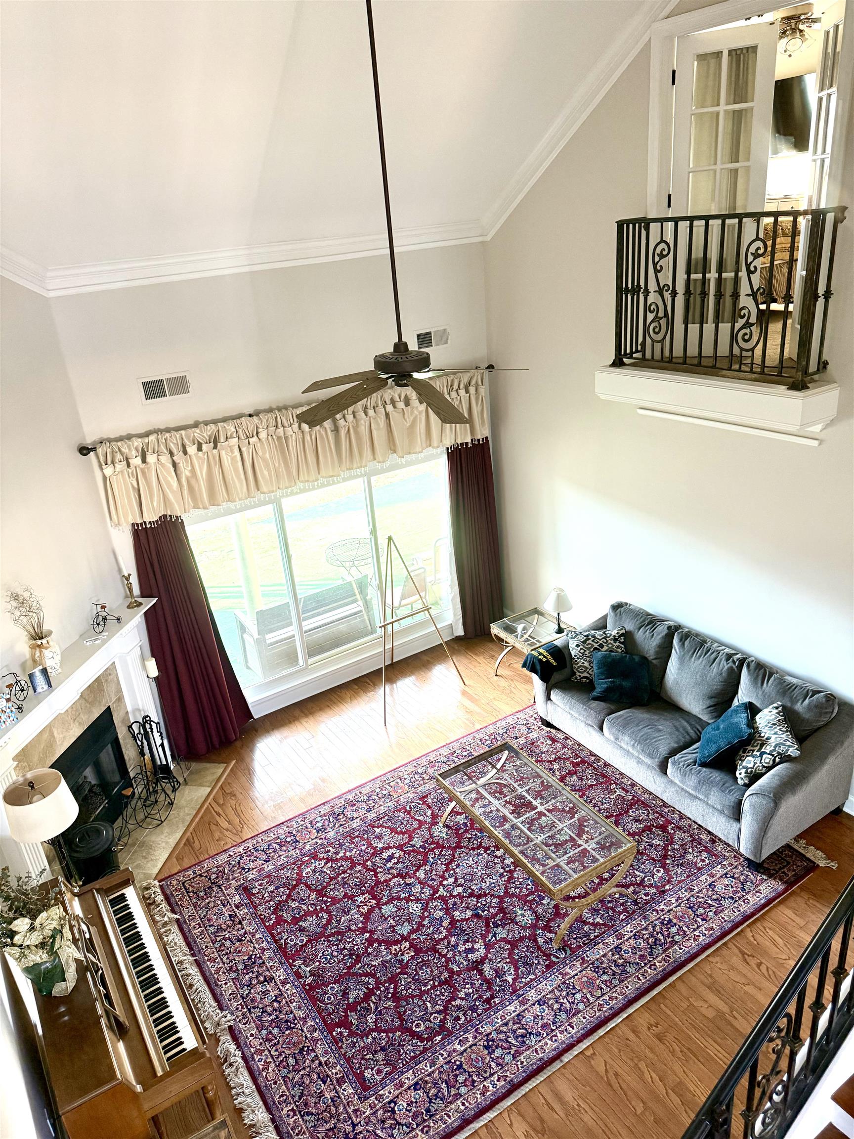 7935 Oak Spring Cove Millington, TN 38053 - Photo 4 of 39 a bedroom with a bed and a couch