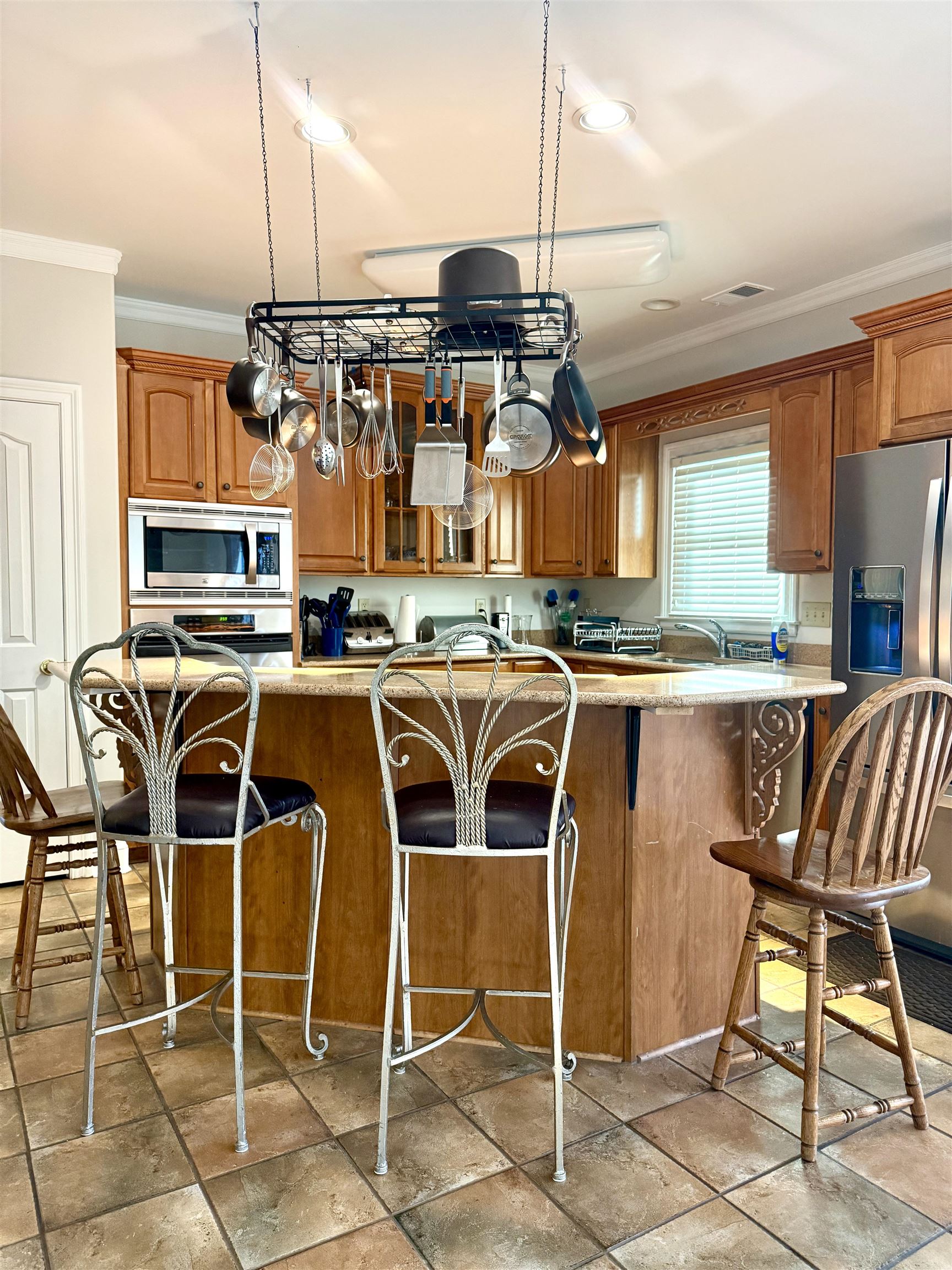 7935 Oak Spring Cove Millington, TN 38053 - Photo 6 of 39 a kitchen with a table and chairs in it