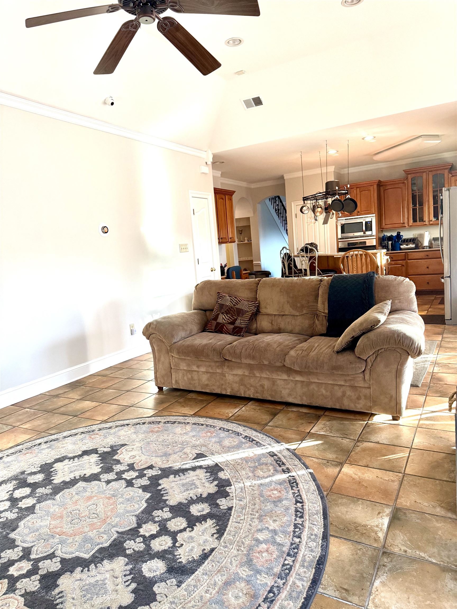 7935 Oak Spring Cove Millington, TN 38053 - Photo 8 of 39 a living room with furniture and kitchen view