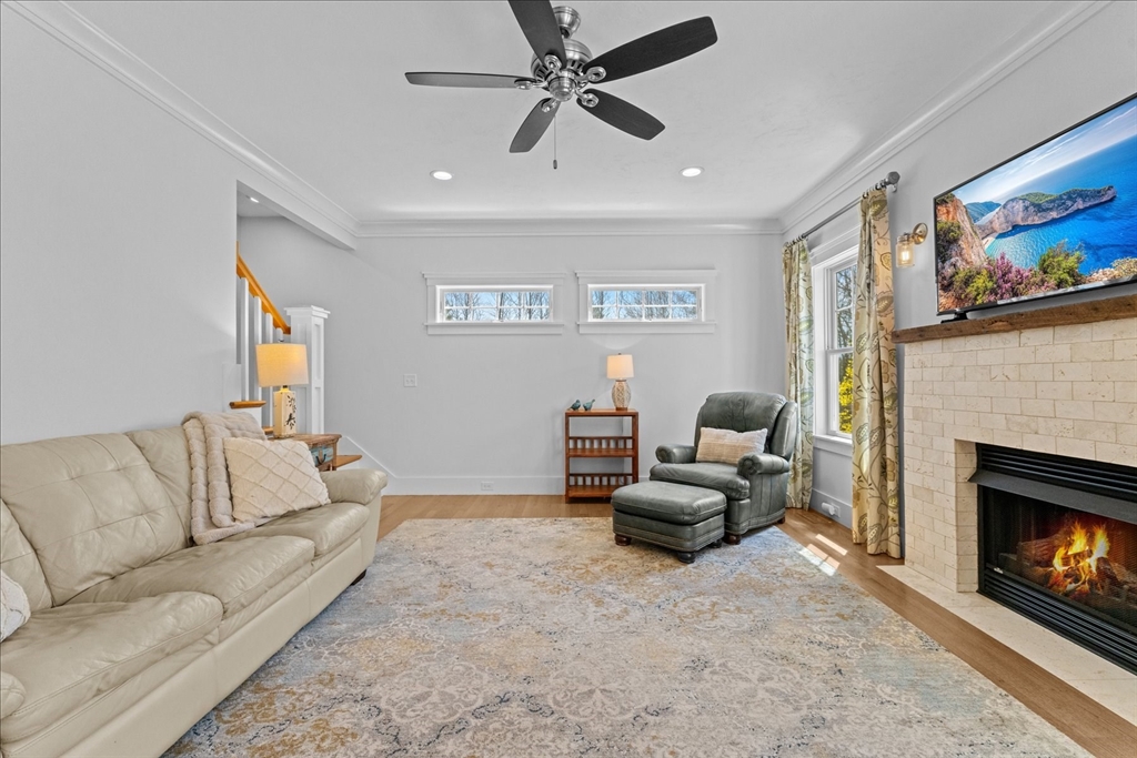 50 Quabbin Path Sutton, MA 01590 - Photo 19 of 42 a living room with furniture and a fireplace