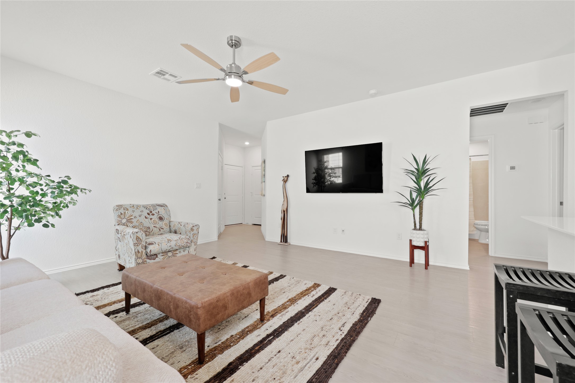 1073 Soapstone Pass Maxwell, TX 78656 - Photo 4 of 28 a living room with furniture and a flat screen tv