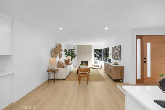 a view of a living room and dining room