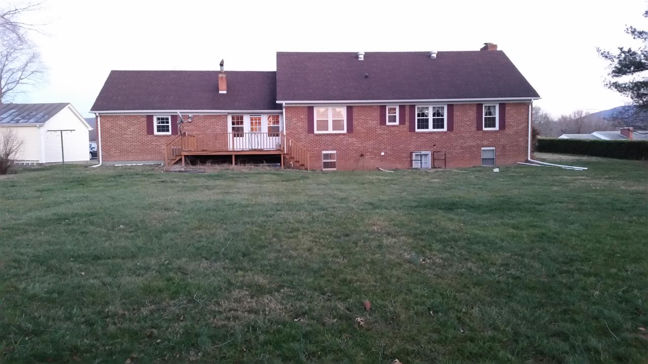 2807 Lyndhurst Road Waynesboro, VA 22980 - Photo 2 of 6 a view of a yard in front of a house