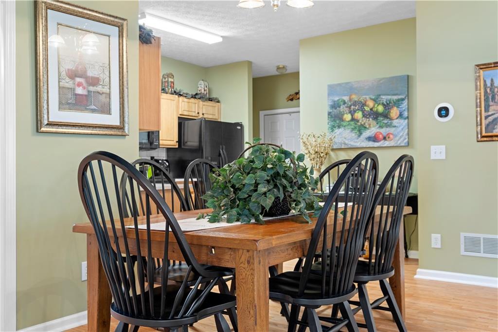 3731 Villa Springs Circle Powder Springs, GA 30127 - Photo 10 of 34 a view of a dining room with furniture
