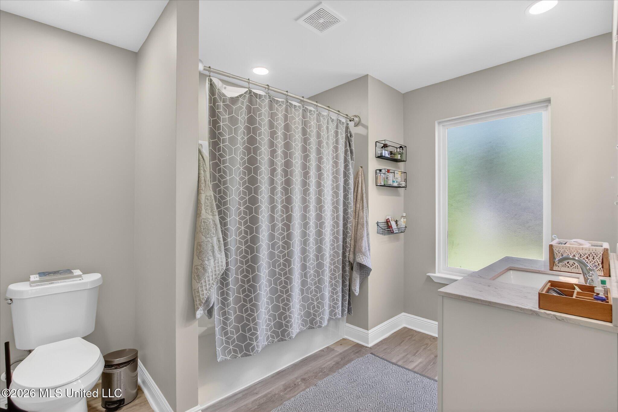 1412 Spruce Street Ocean Springs, MS 39564 - Photo 23 of 44 Owner's Suite Bathroom