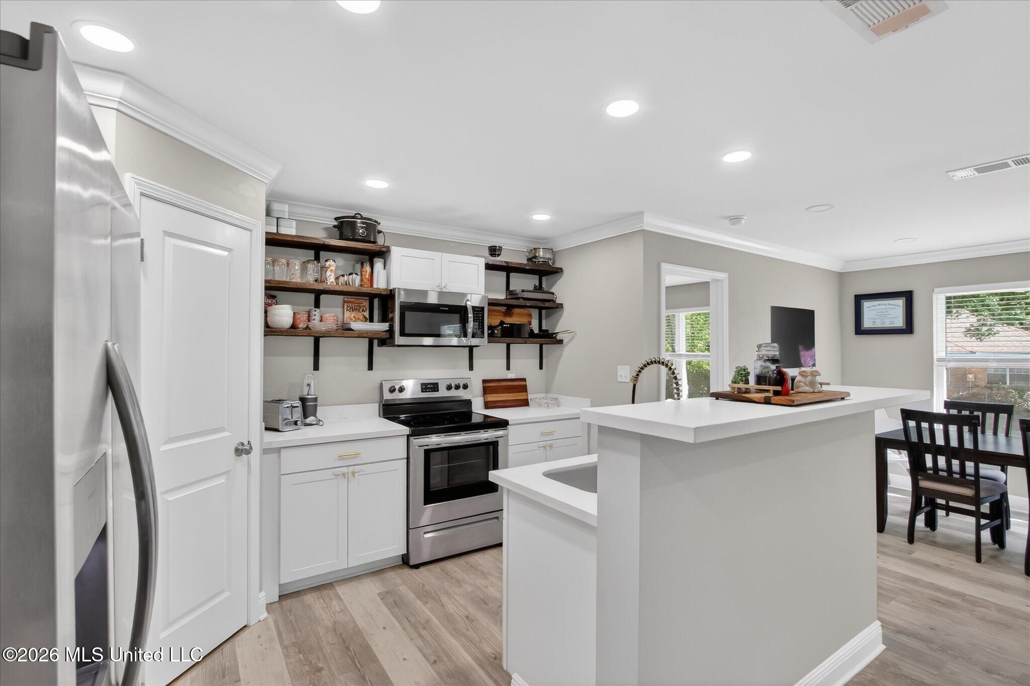 1412 Spruce Street Ocean Springs, MS 39564 - Photo 7 of 44 Kitchen Side View