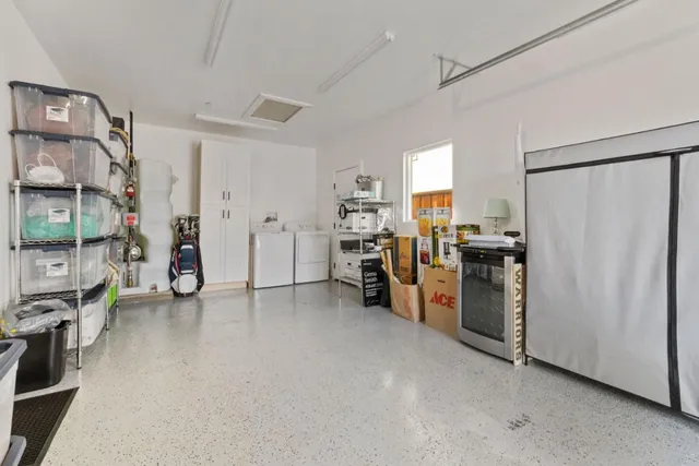 a view of a backyard with pathway