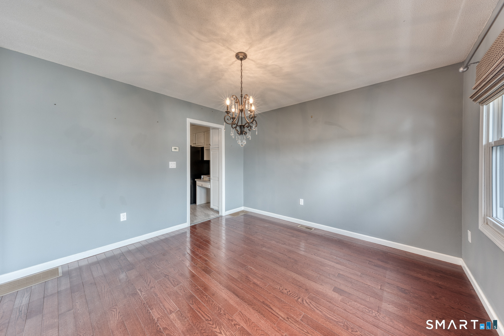 5 Vicki Lane, Unit 5 Colchester, CT 06415 - Photo 12 of 42 wooden floor in an empty room with a window