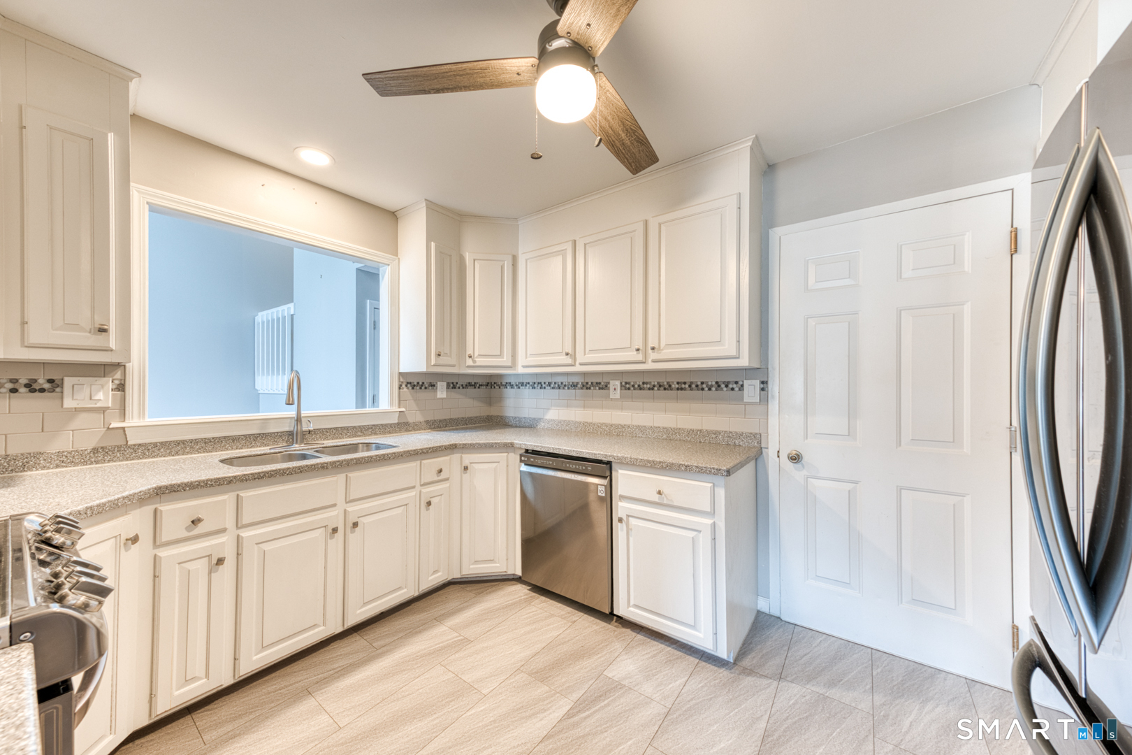 5 Vicki Lane, Unit 5 Colchester, CT 06415 - Photo 15 of 42 a kitchen with white cabinets and sink