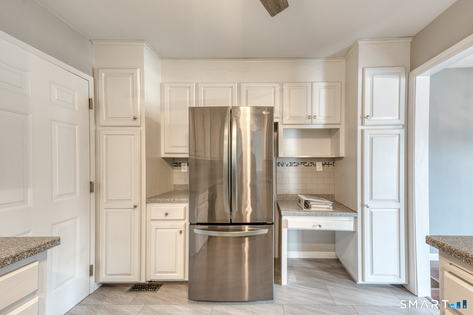 5 Vicki Lane, Unit 5 Colchester, CT 06415 - Photo 18 of 42 a kitchen with stainless steel appliances a refrigerator and cabinets