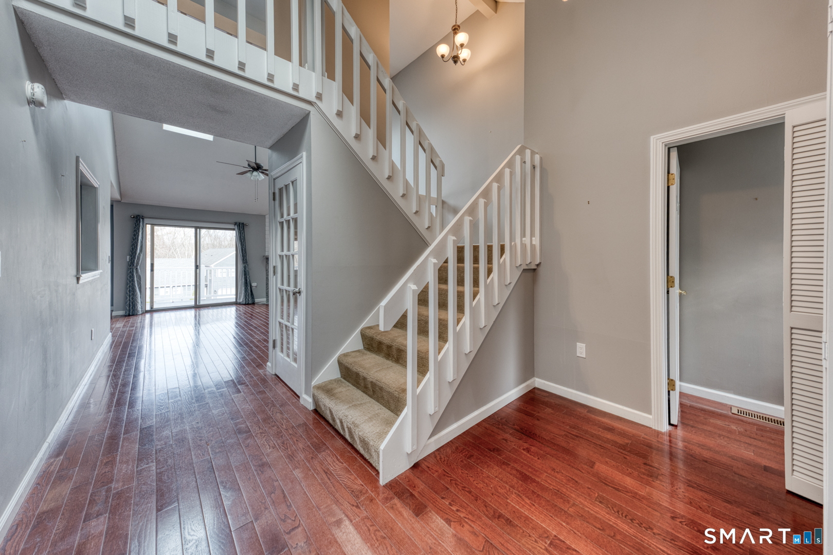 5 Vicki Lane, Unit 5 Colchester, CT 06415 - Photo 20 of 42 a view of entryway and hall with wooden floor