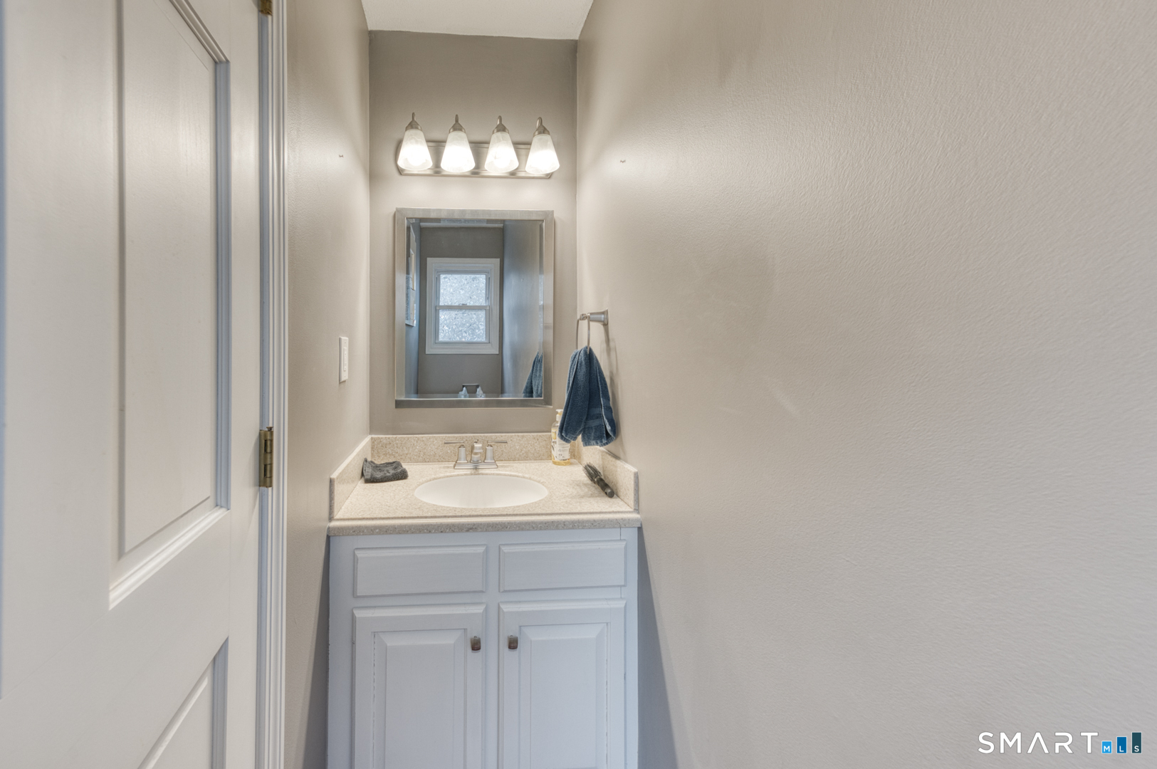 5 Vicki Lane, Unit 5 Colchester, CT 06415 - Photo 22 of 42 a bathroom with a sink and a mirror