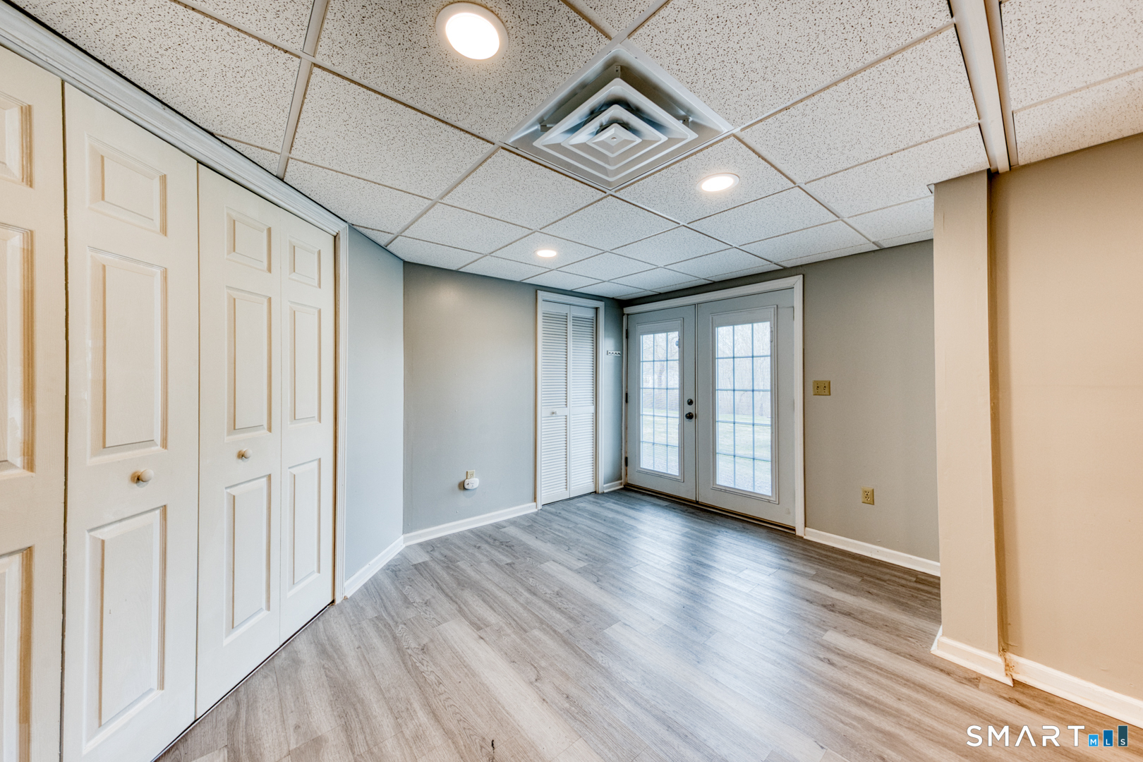 5 Vicki Lane, Unit 5 Colchester, CT 06415 - Photo 35 of 42 a view of an empty room with wooden floor