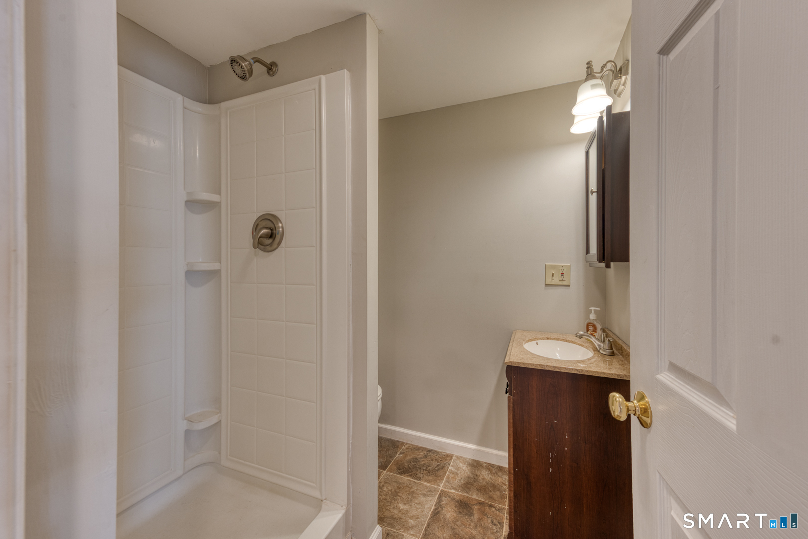 5 Vicki Lane, Unit 5 Colchester, CT 06415 - Photo 36 of 42 a bathroom with a shower