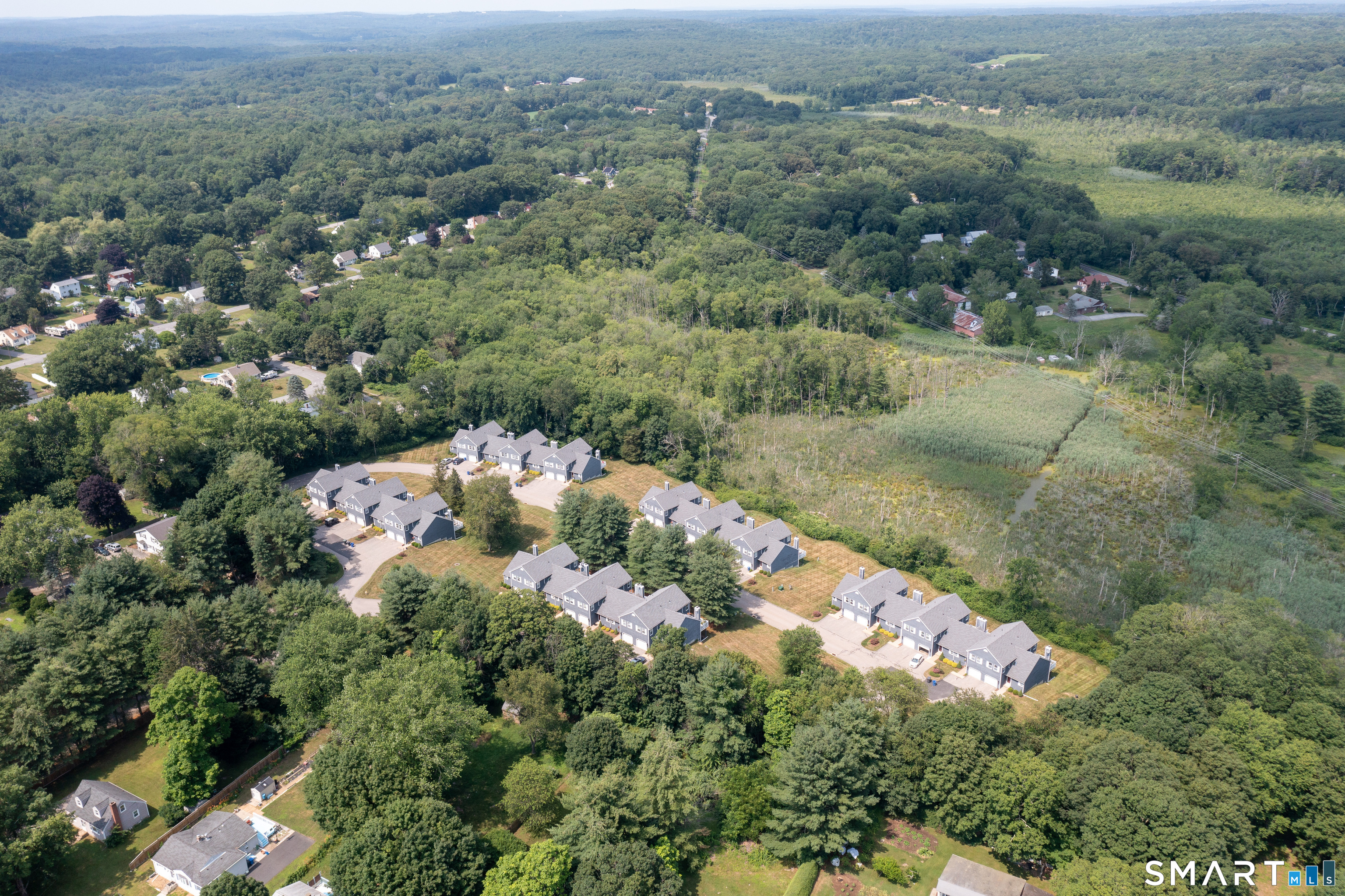 5 Vicki Lane, Unit 5 Colchester, CT 06415 - Photo 6 of 42 an aerial view of a house with a yard