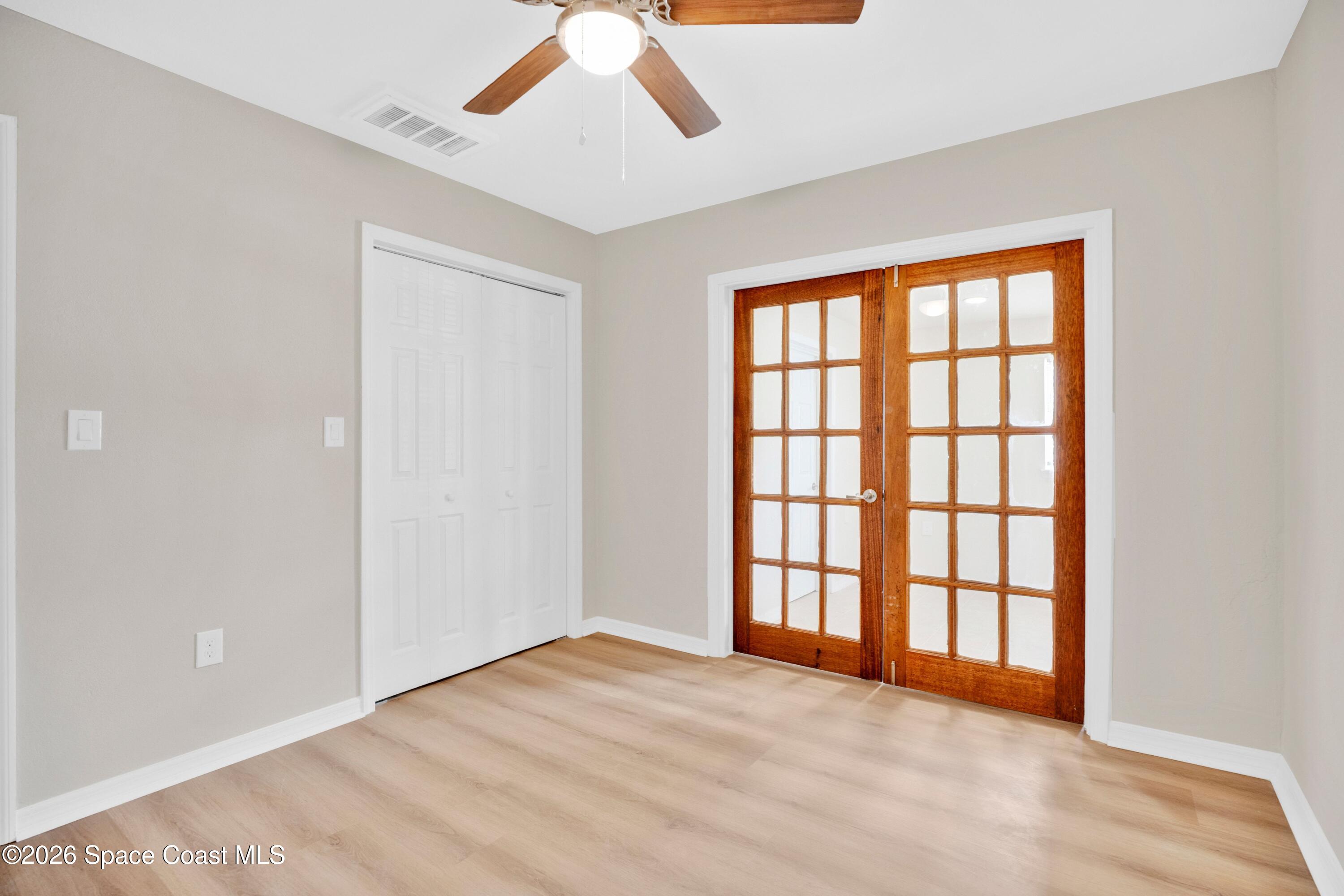 1215 Counts Street Cocoa, FL 32922 - Photo 8 of 25 a view of an empty room with a window