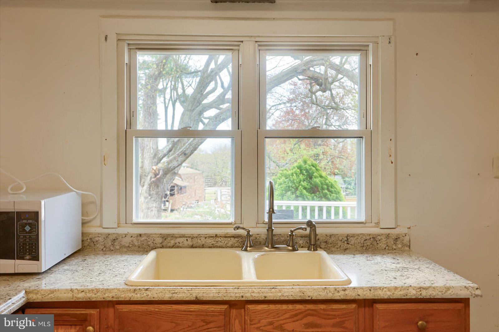 2301 Snow Road Edgewood, MD 21040 - Photo 16 of 41 a bathroom with granite countertop window and a sink