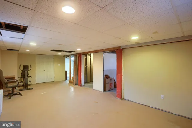 a bathroom with a toilet and shower