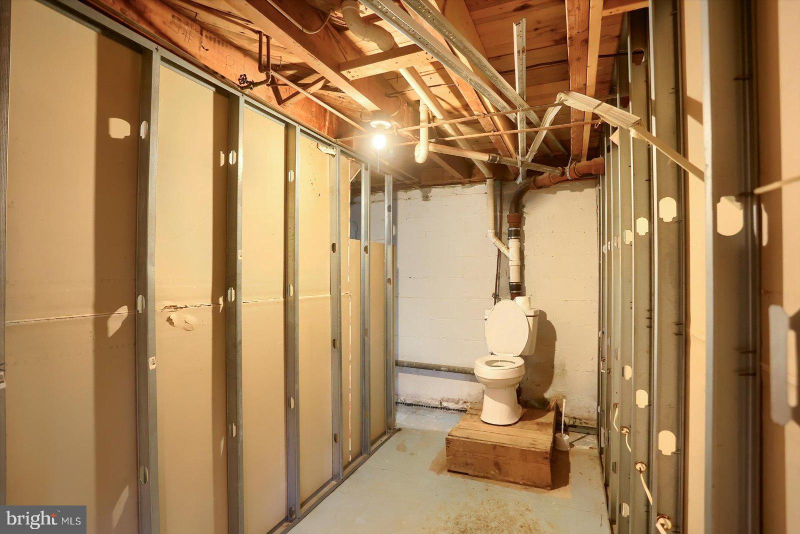 2301 Snow Road Edgewood, MD 21040 - Photo 28 of 41 a bathroom with a toilet and shower