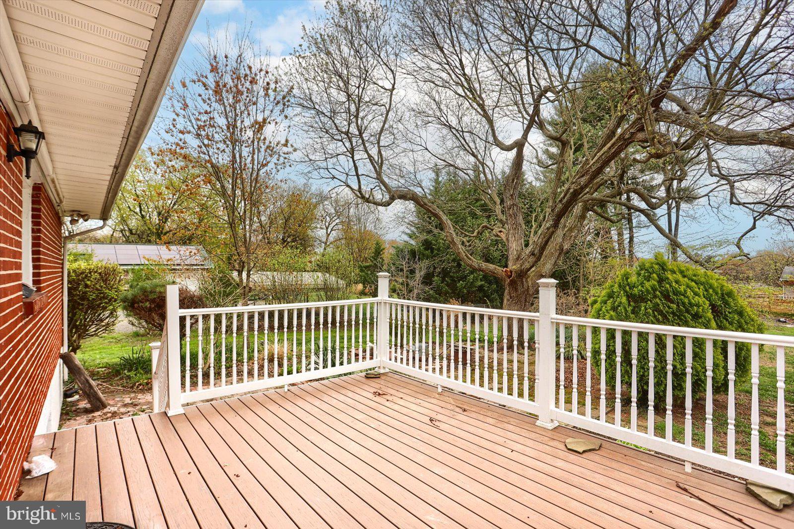 2301 Snow Road Edgewood, MD 21040 - Photo 32 of 41 a view of balcony with wooden floor and fence