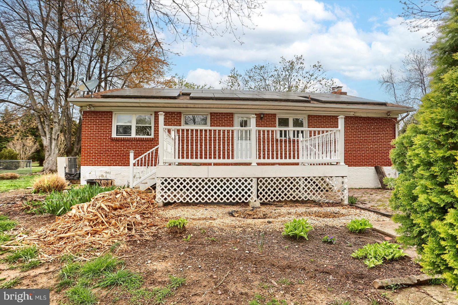 2301 Snow Road Edgewood, MD 21040 - Photo 34 of 41 a front view of a house with a garden